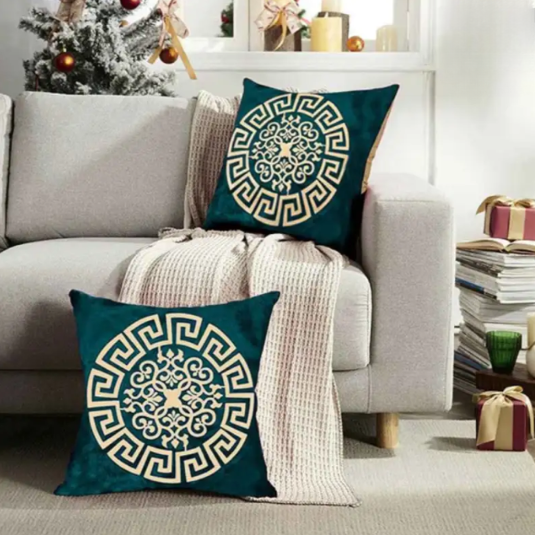 PAIR OF GREEN VELVET CUSHIONS